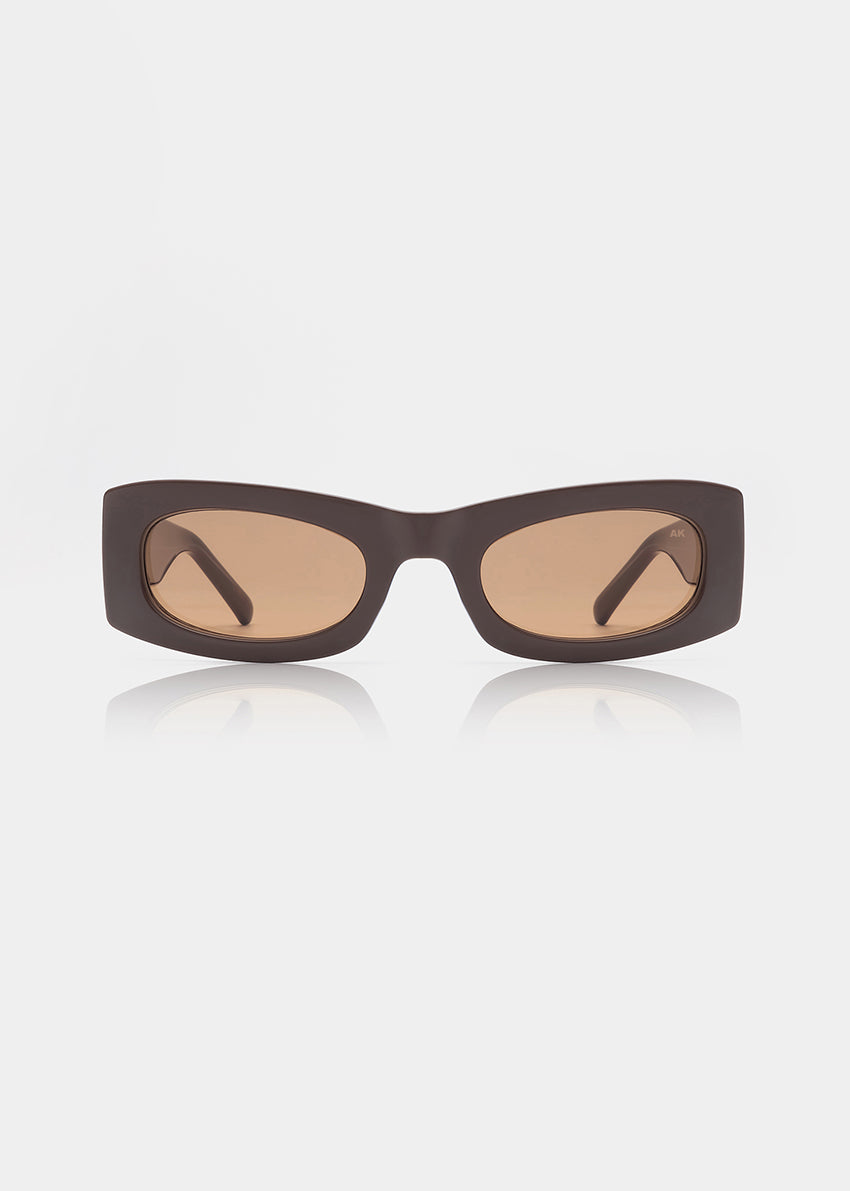 Sunglasses with a chocolate frame and lenses on a white background