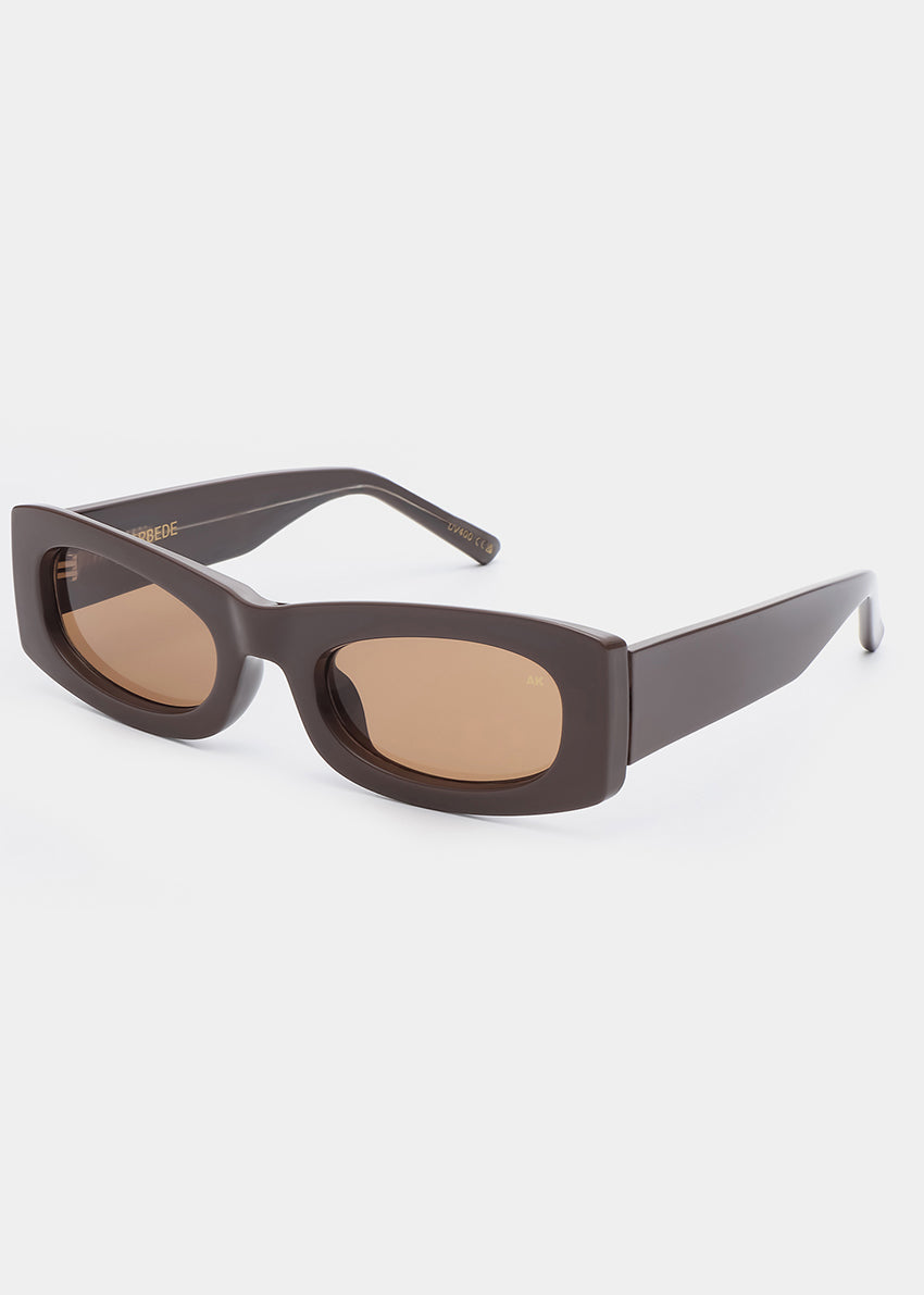 Sunglasses with brown lenses and chocolate frame on a white background