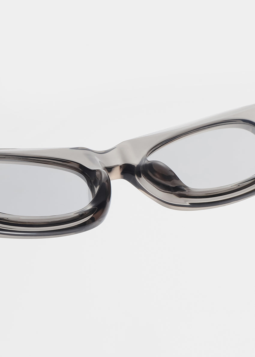 Pair of eyeglasses with a clear frame on a white background