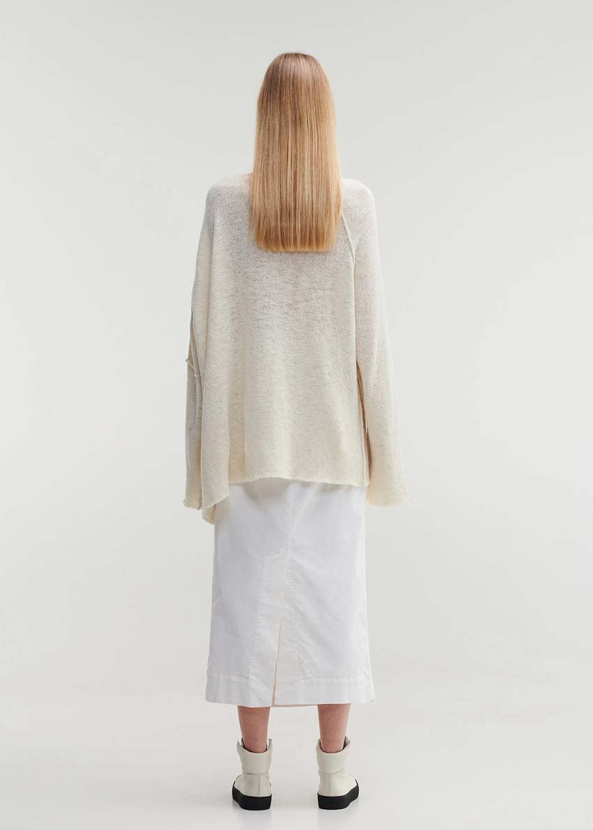 Raw edges punk sweater with dropped shoulders and an eye-catching asymmetric hemline for a stylish yet cozy and casual look.Because of the mix of fibres, like wool and silk, the texture of the sweater feel really soft and warm on the skin.