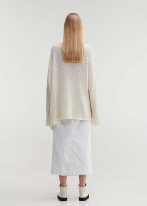 Raw edges punk sweater with dropped shoulders and an eye-catching asymmetric hemline for a stylish yet cozy and casual look.Because of the mix of fibres, like wool and silk, the texture of the sweater feel really soft and warm on the skin.