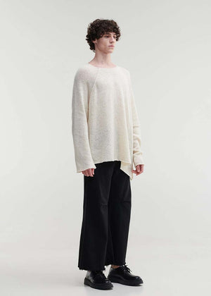 Raw edges punk sweater with dropped shoulders and an eye-catching asymmetric hemline for a stylish yet cozy and casual look.Because of the mix of fibres, like wool and silk, the texture of the sweater feel really soft and warm on the skin.