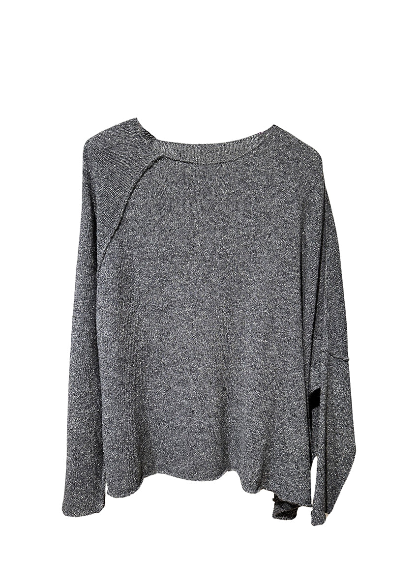 Raw edges punk sweater with dropped shoulders and an eye-catching asymmetric hemline for a stylish yet cozy and casual look.Because of the mix of fibres, like wool and silk, the texture of the sweater feel really soft and warm on the skin.