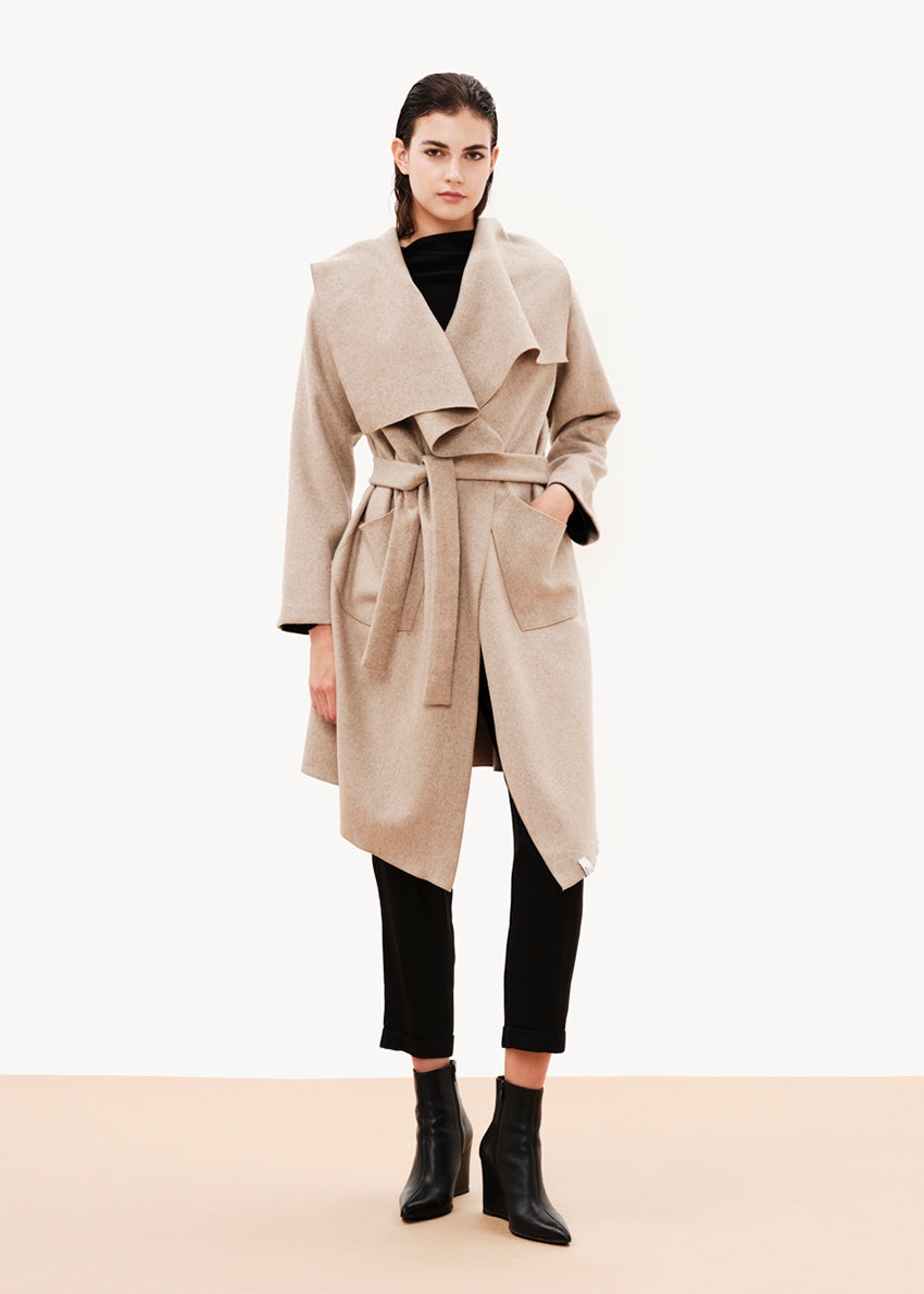 Elegant, unique, and effortless draped jacket made of wool blend, is the perfect alternative for your winter outfits. Its stylish character combined with its relaxed design result in a garment that could upgrade even the simplest of outfits.