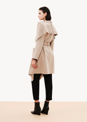 Elegant, unique, and effortless draped jacket made of wool blend, is the perfect alternative for your winter outfits. Its stylish character combined with its relaxed design result in a garment that could upgrade even the simplest of outfits.