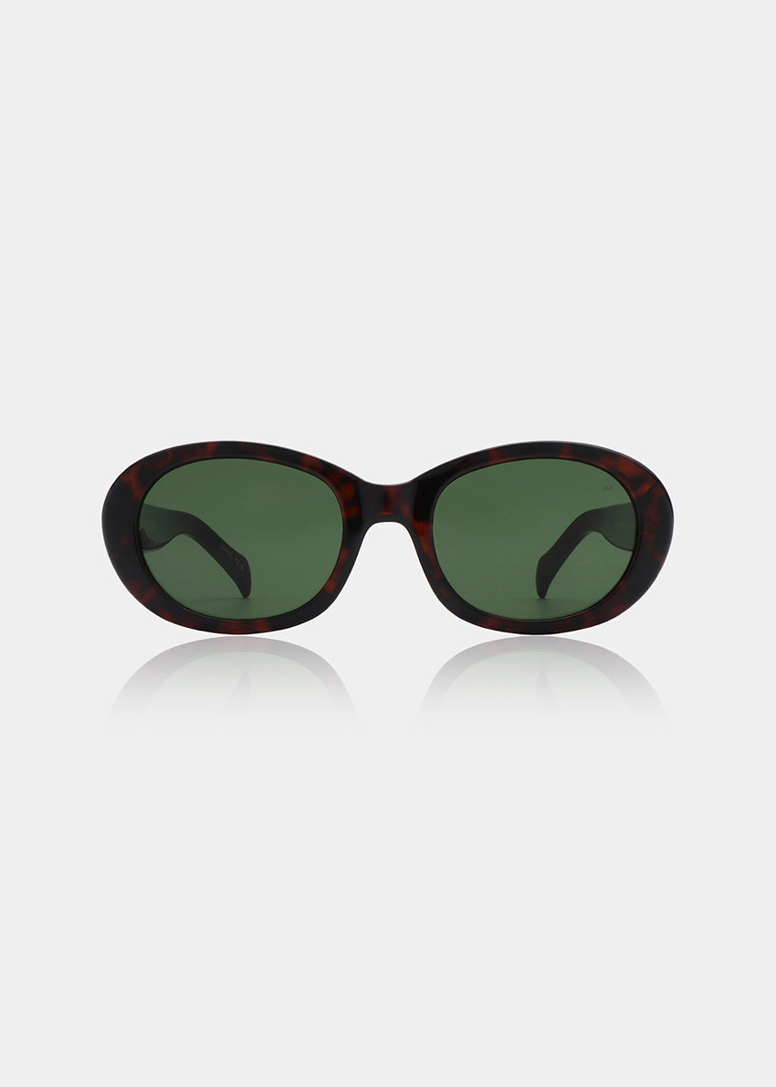 Sunglasses with a tortoiseshell frame and dark lenses on a light gray background