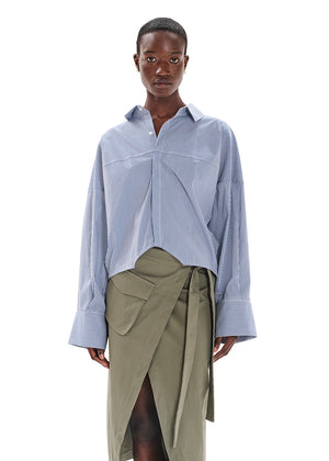 Made with durable, high-quality cotton fabric, this skirt is designed with a unique wrap-style and boasts a large pocket and generous front slit. Perfect for everyday wear!