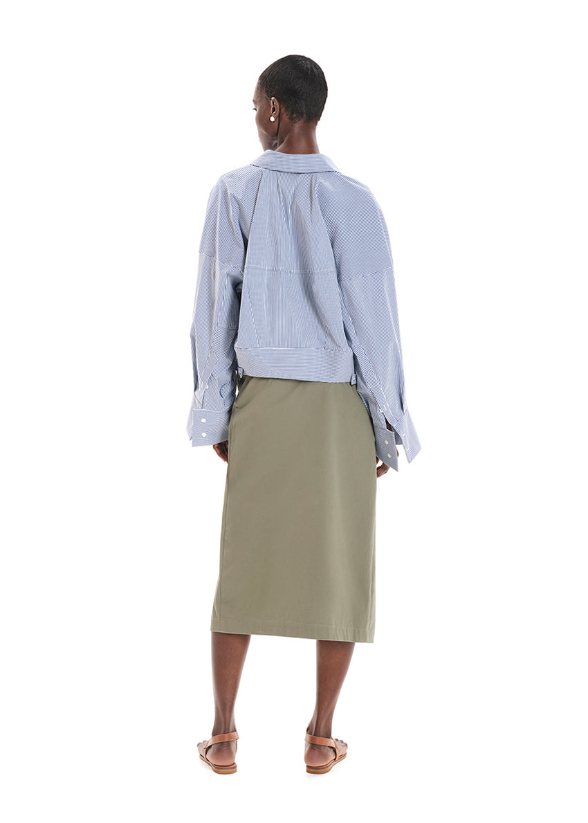 Made with durable, high-quality cotton fabric, this skirt is designed with a unique wrap-style and boasts a large pocket and generous front slit. Perfect for everyday wear!