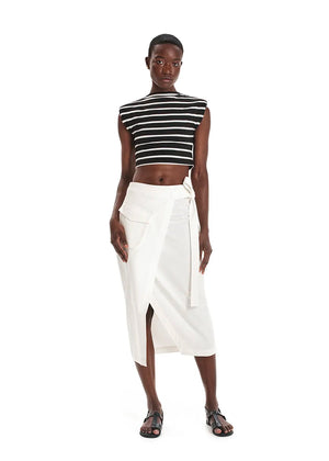 Made with durable, high-quality cotton fabric, this skirt is designed with a unique wrap-style and boasts a large pocket and generous front slit. Perfect for everyday wear!