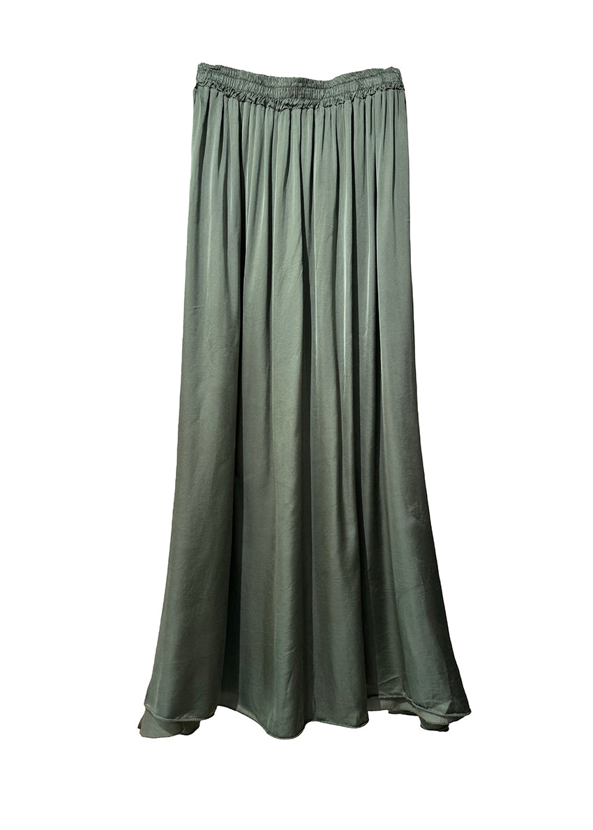 Green satin skirt on a white background