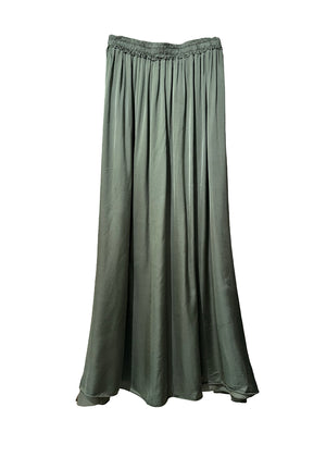 Green satin skirt on a white background