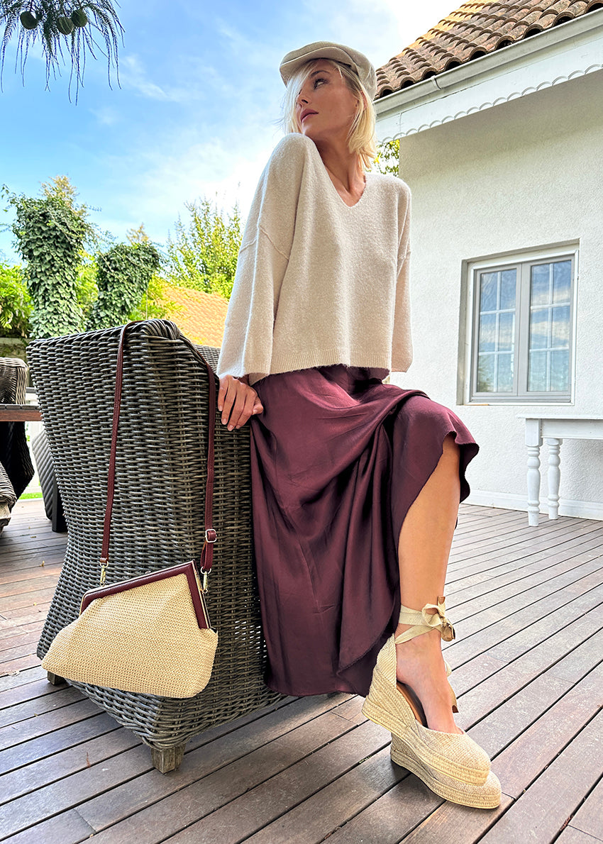 Long gray skirt on a white background