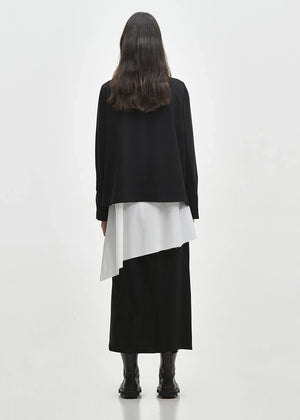 Short jacket, cut for a relaxed slightly A-line silhouette with a lapel collar, made of blended cool wool-type viscose fabric. BAYA can be worn reversibly