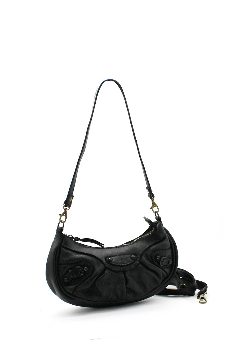 The small postman bag is a stylish and practical accessory made from high-quality lambskin. The bag features adjustable shoulder straps( shorter and longer)