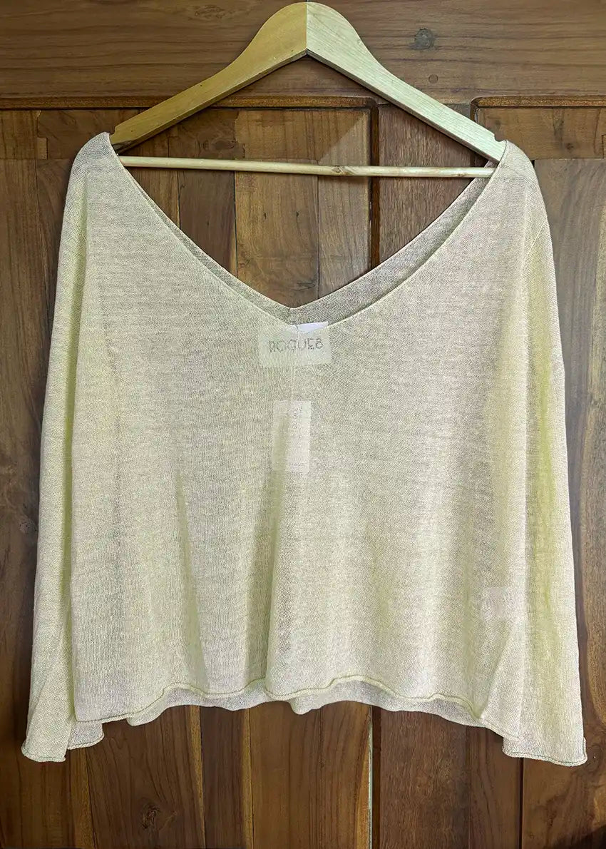 This stylishly funky yet timeless pullover features a medium length, deep V neckline on both sides, wide and relaxed fit, and long sleeves. It adds the perfect finishing touch to any casual look, and is effortlessly easy to pull on.