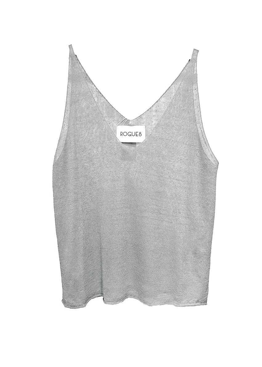 Be it your classic gal or a punk rock chick, this timeless top has got you covered. This versatile top will fulfill all your fashion cravings. A very simple large top, with a wide V front/ back, sleeveless, light and slight transparent knitted tank top