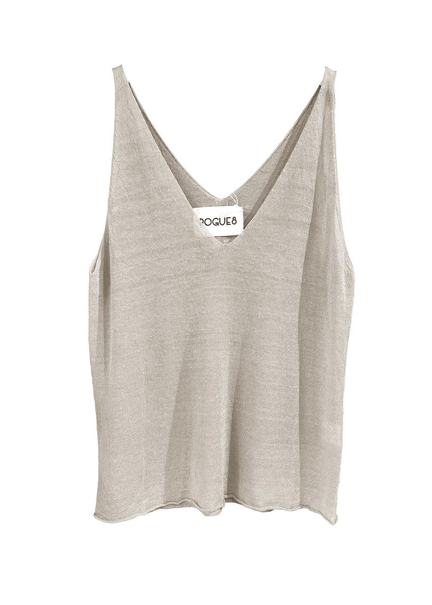 Be it your classic gal or a punk rock chick, this timeless top has got you covered. This versatile top will fulfill all your fashion cravings. A very simple large top, with a wide V front/ back, sleeveless, light and slight transparent knitted tank top