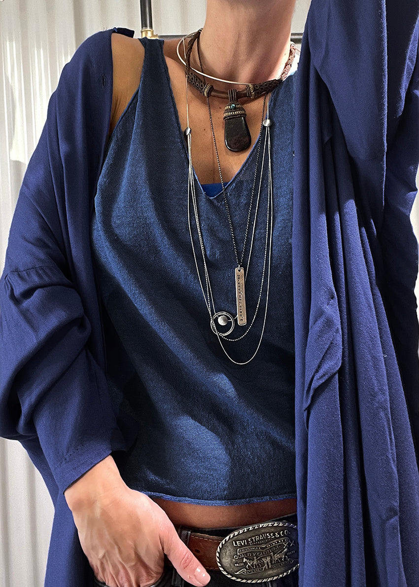 This top is like the sexy alter ego of the Miaou Top, complete with a playful halter back. With a wide V front neckline and open halter back. Its lightweight and slightly sheer texture