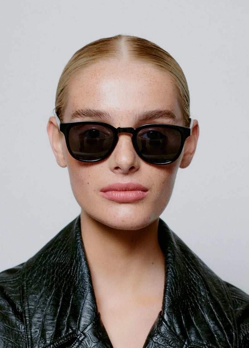 Black sunglasses on a white background