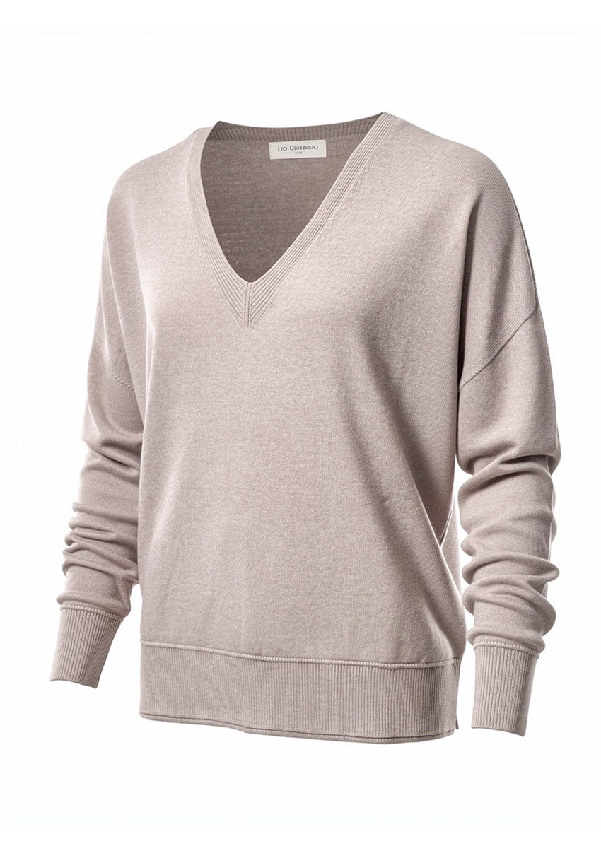 Beige sweater on a white background