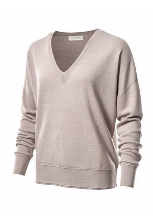 Beige sweater on a white background