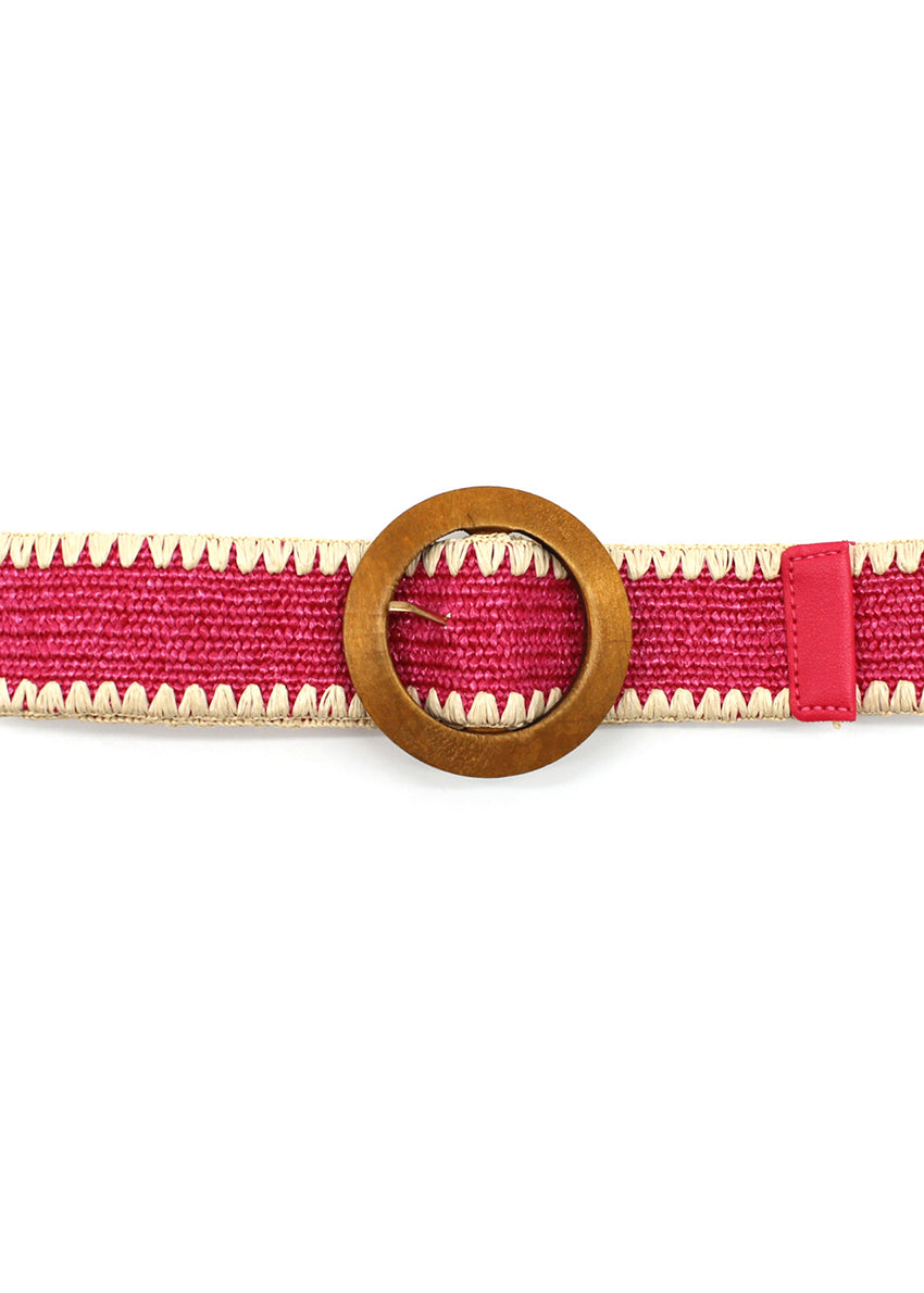 A pink raffia belt with a wooden buckle and decorative edge, against a white background.