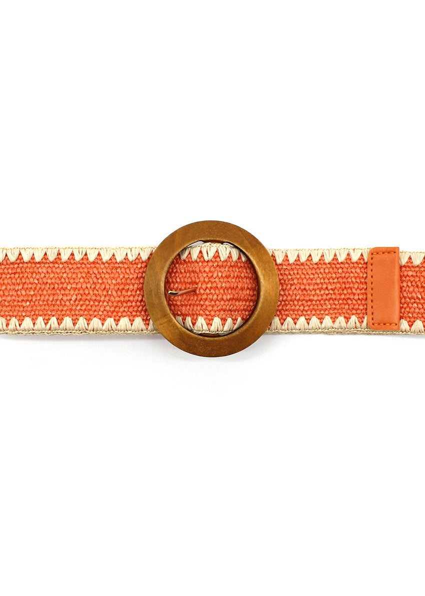 A orange raffia belt with a wooden buckle and decorative edge, against a white background.