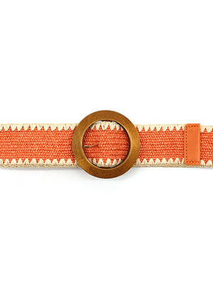A orange raffia belt with a wooden buckle and decorative edge, against a white background.