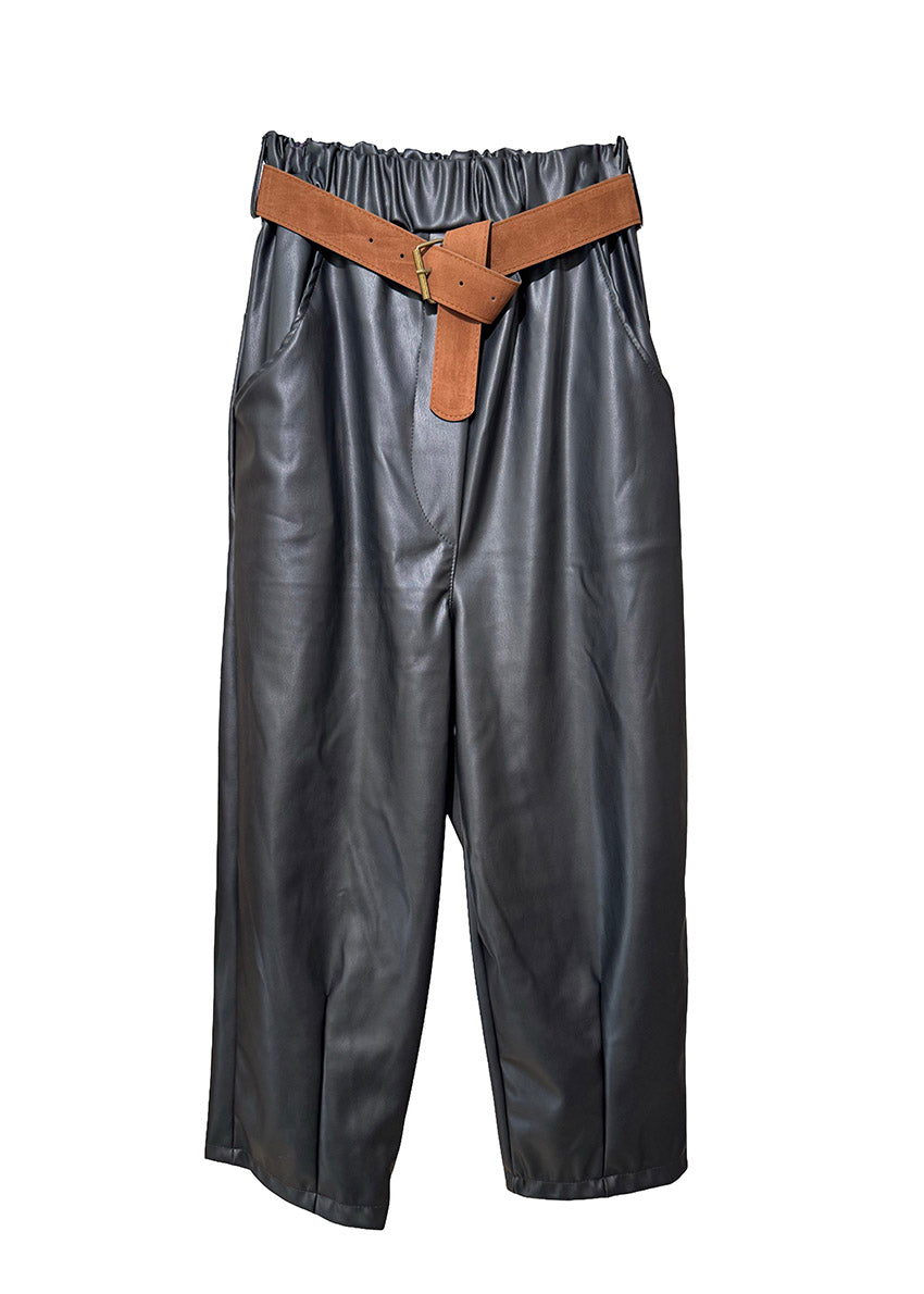 Black leather pants with a brown belt on a white background