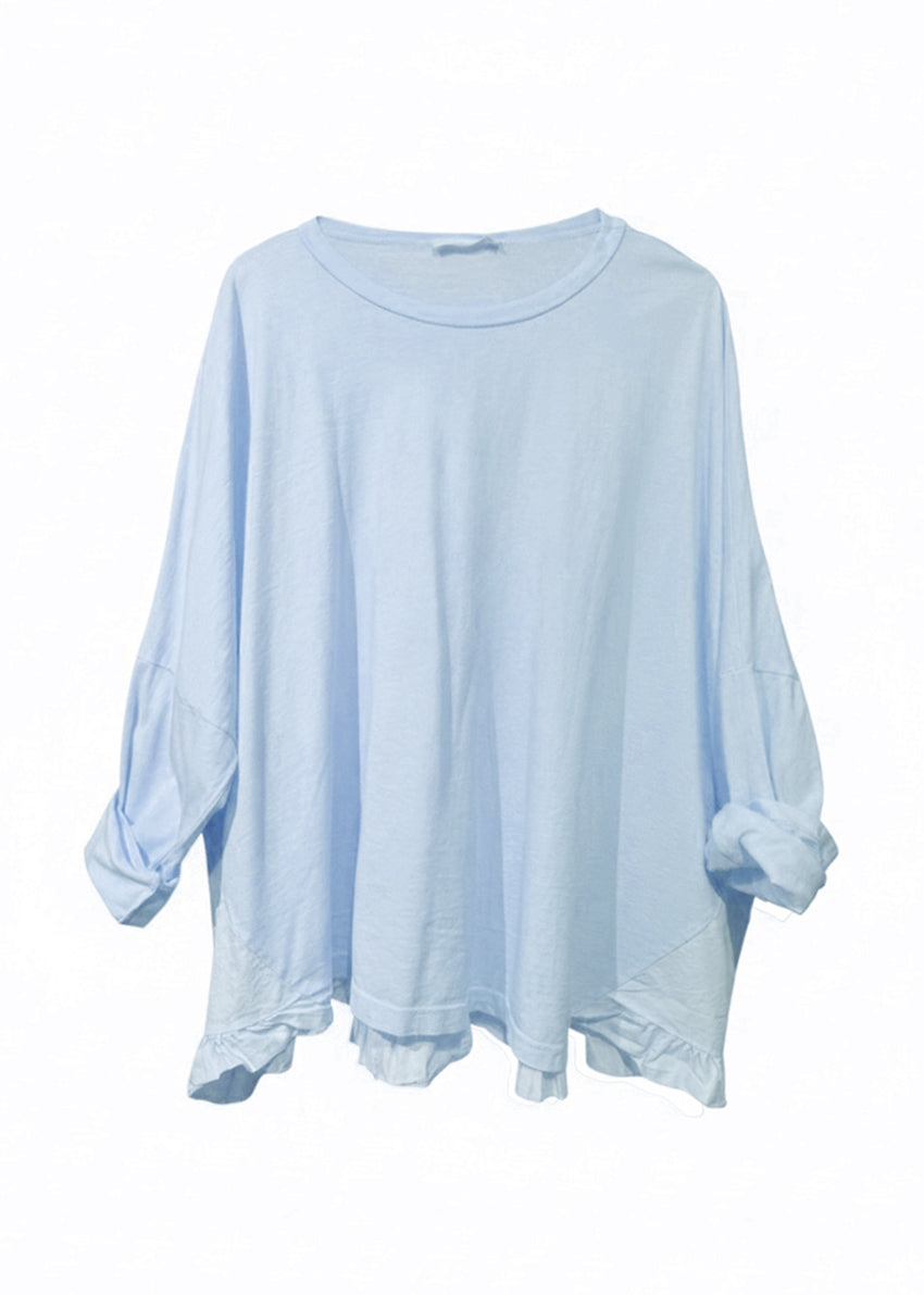 Light blue oversized shirt on a white background