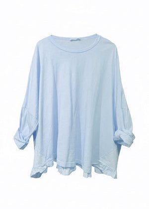 Light blue oversized shirt on a white background