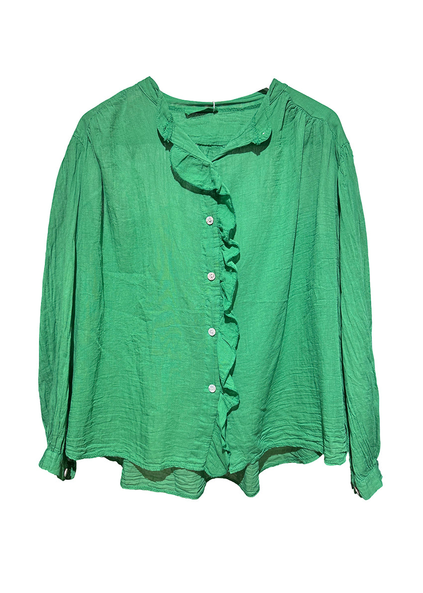 Green blouse with ruffled collar on a white background