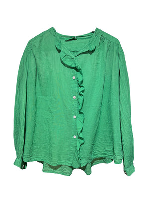 Green blouse with ruffled collar on a white background