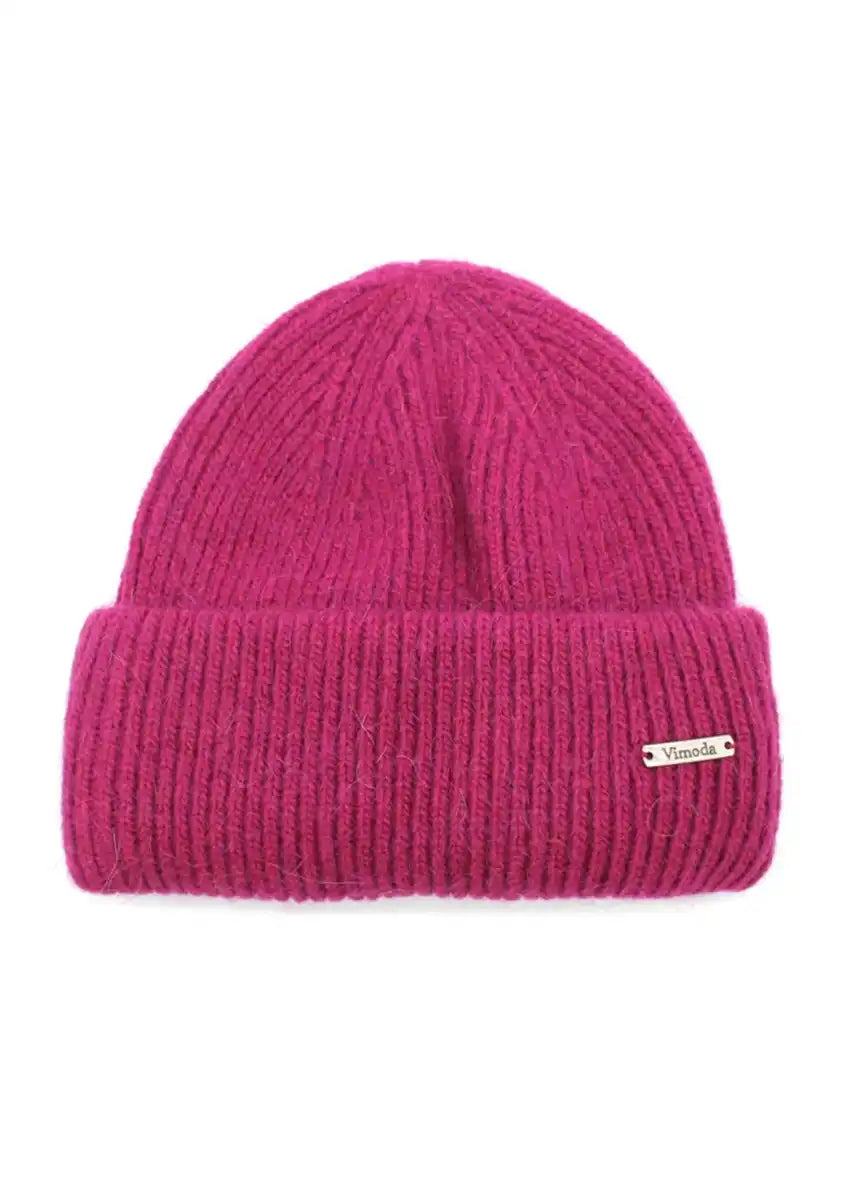 Unisex pink beanie, artfully crafted from a luxurious melange of soft fibers. The color block design exudes effortless sophistication, providing endless styling possibilities.