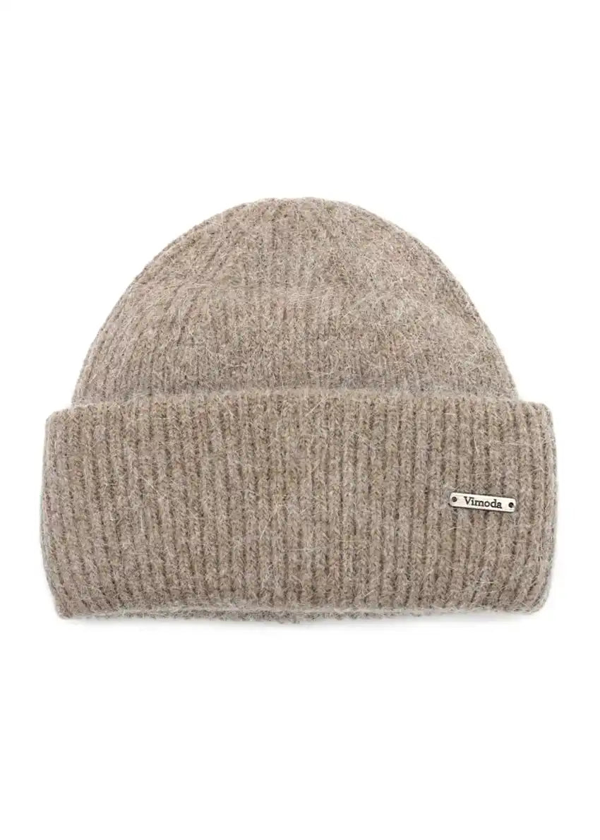 Unisex tan beanie, artfully crafted from a luxurious melange of soft fibers. The color block design exudes effortless sophistication, providing endless styling possibilities.