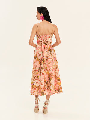 Woman wearing a floral dress on a white background