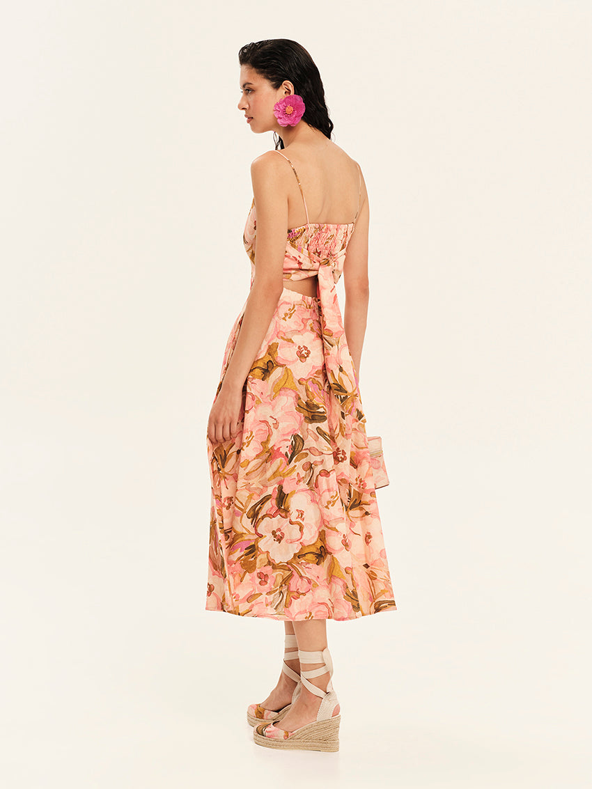 Woman wearing a floral dress on a white background