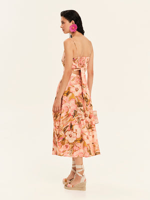 Woman wearing a floral dress on a white background