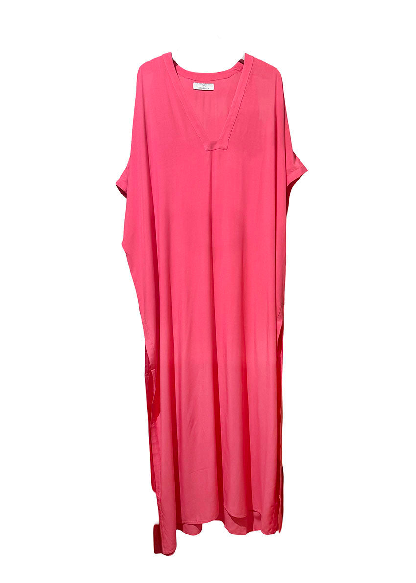 A  deep pink maxi length tunic with a v-neckline and bare shoulders made of soft rayon fabric.