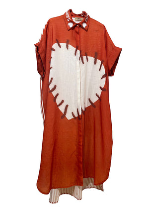 Red shirt with a white heart design on a white background