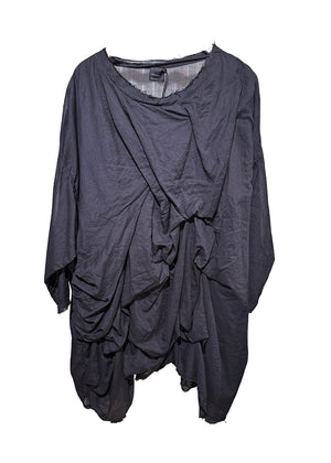 Asymmetrical, long black sleeve blouse in oversized fit, with large ruffles on the front side and round neck