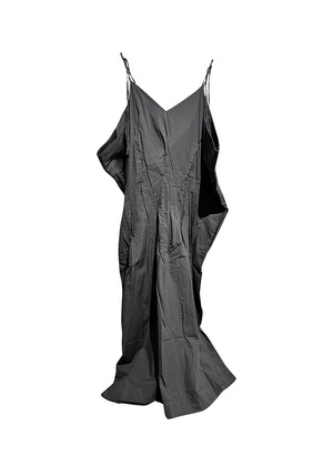 Long dress with thin straps, cut for a relaxed fit, made of soft cotton poplin. CASO features a V neck both in the front and back, open low armholes creating draping on the sides, and decorative nervirs on the front side.