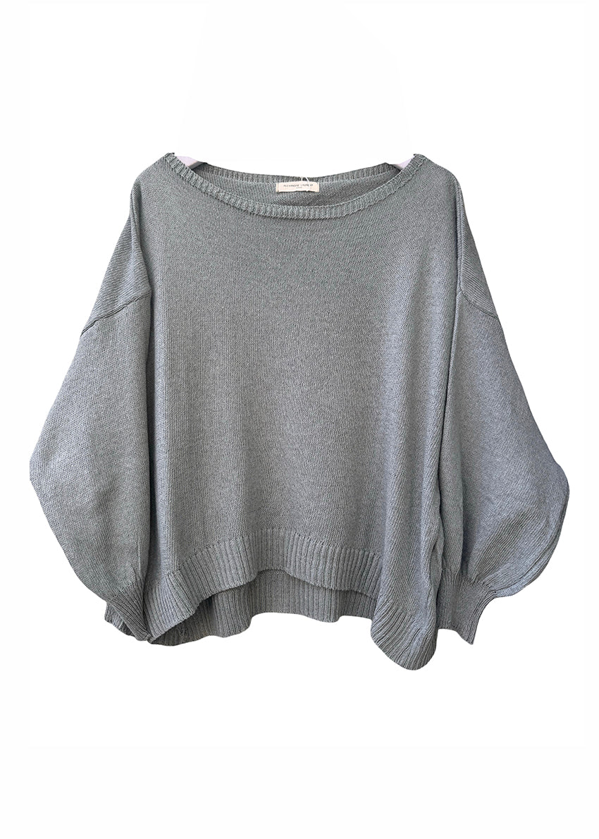 Green sweater on a white background