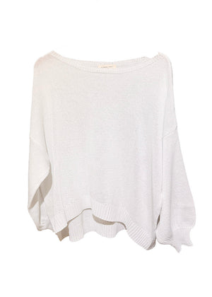 White knit sweater on a white background
