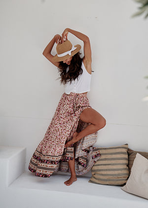 This boho skirt was part of the collection a few years ago and is now being re-released by Jaase. The skirt features an elastic waistband that can be adjusted and fastens at the front with buttons.