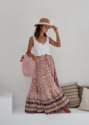 This boho skirt was part of the collection a few years ago and is now being re-released by Jaase. The skirt features an elastic waistband that can be adjusted and fastens at the front with buttons.