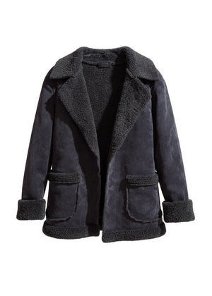 Black shearling short coat. Featuring a plush faux-shearling lining, cozy collar, and practical front pockets.