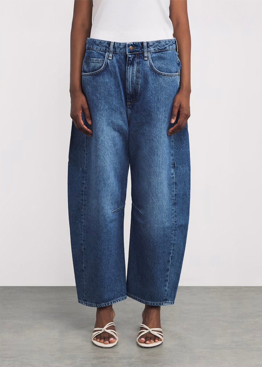 Pair of blue jeans on a white background