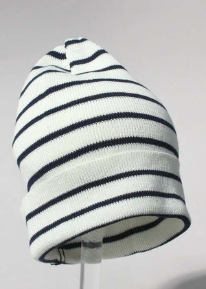 A striped cotton beanie hat with black and white colors.