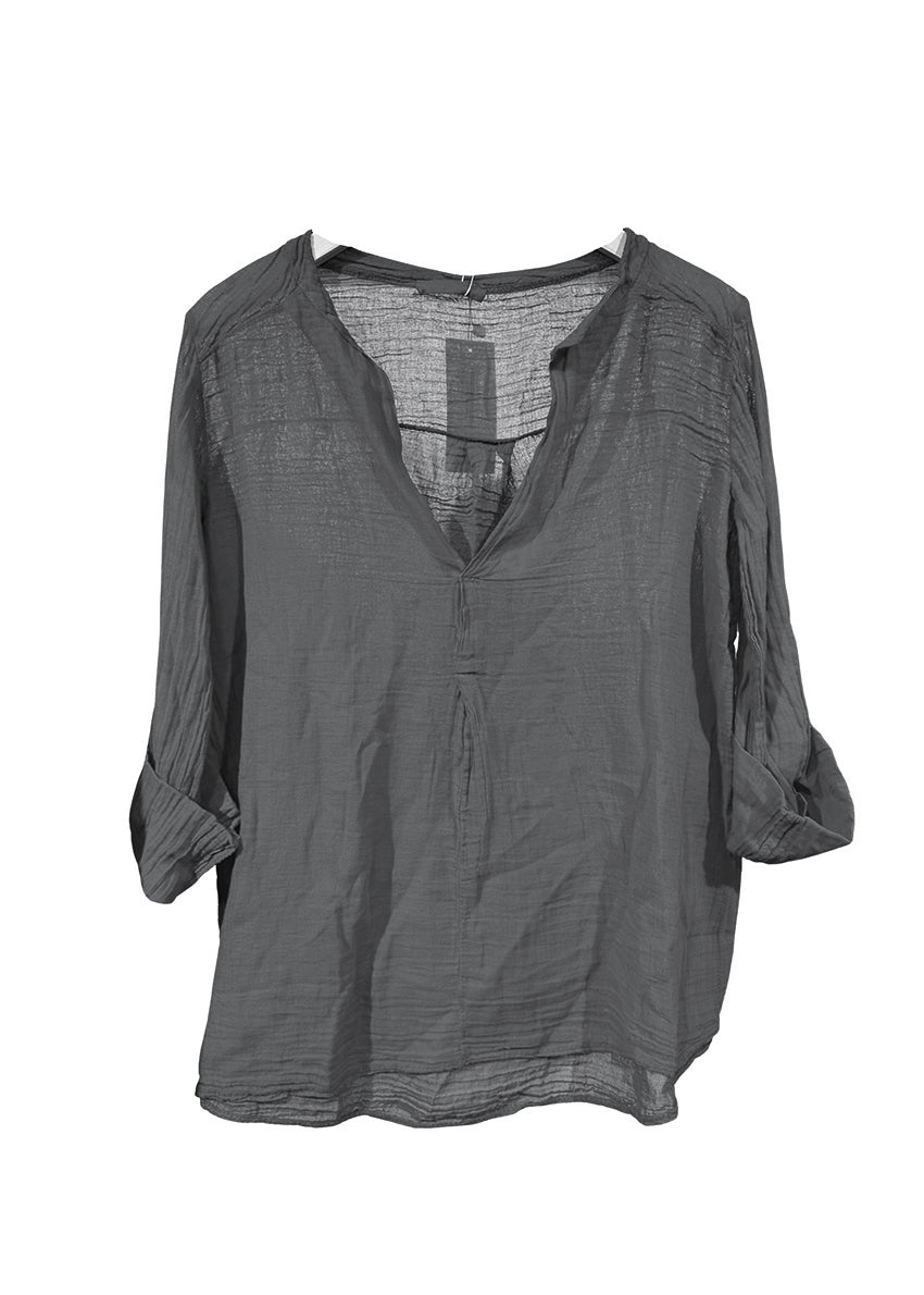 Gray blouse with a V-neck and long sleeves on a white background